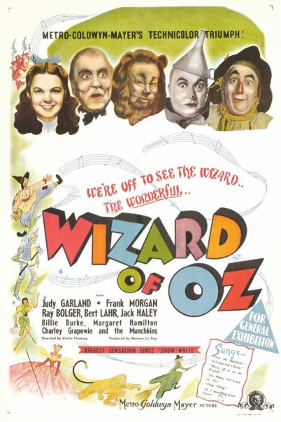Wizard of Oz movie poster, faces of five main characters, musical staff
