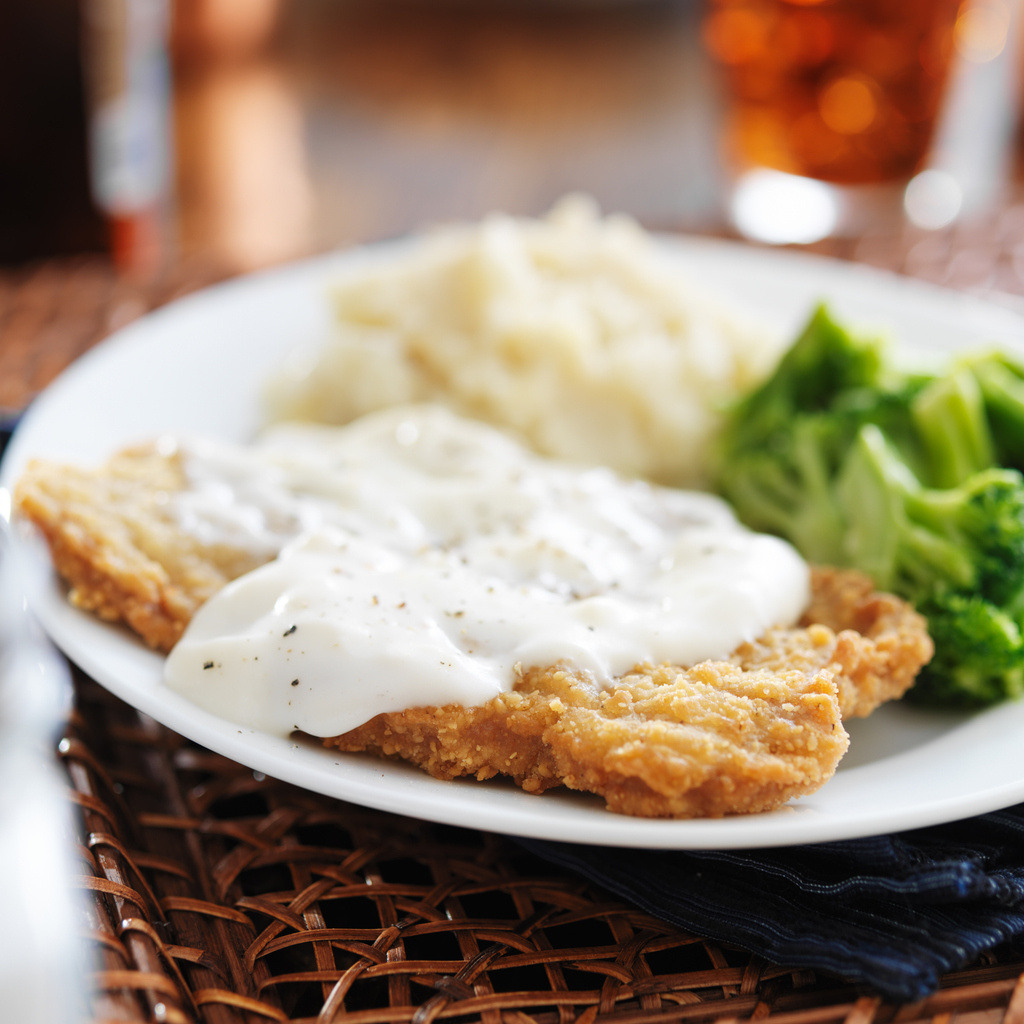 chicken fried steak with Southern style peppered milk gravy